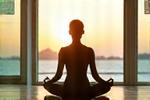 A person practicing yoga, symbolizing stress reduction and flexibility.